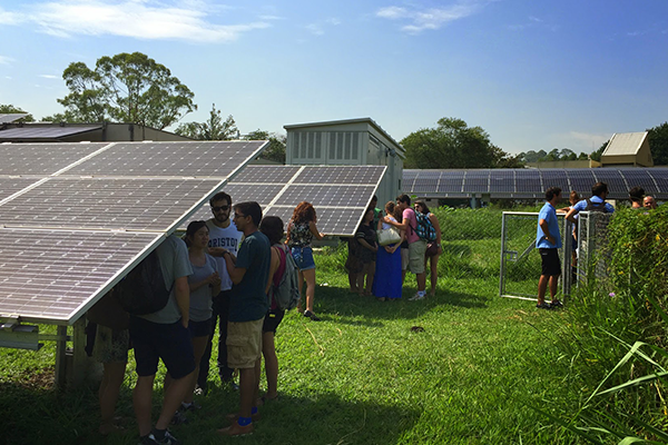 students visiting solar research facility in Sao Paulo, Brazil