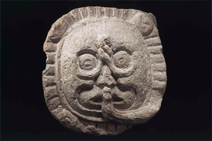 stone sculpture of Maya jaguar sun god