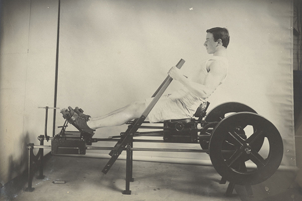 man using reclining exercise equipment.
