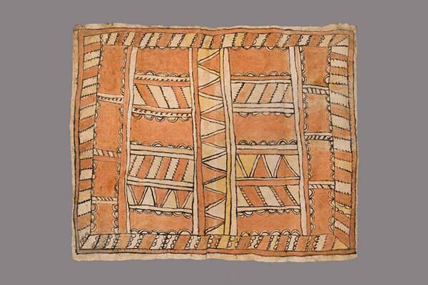 Tapa cloth with overall geometric design in red and yellow outlined with black