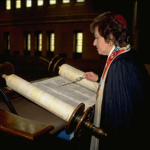 Woman reading the Torah