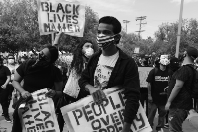 Protestors hold a "Black Lives Matter" sign