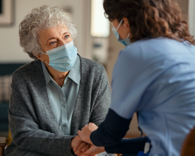 Older adult with doctor care