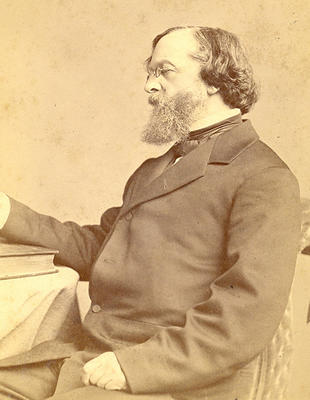 Photograph of James Freeman Clarke sitting, in profile (bMS 1446/33)