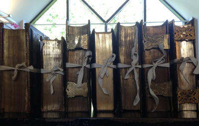 Row of large family bibles with gilt edges