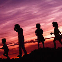kids playing at dusk