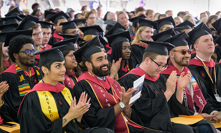 Graduates applauding 