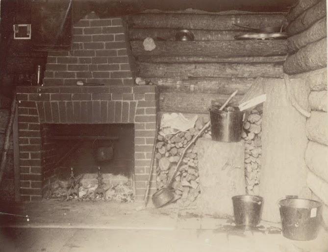 Cabin kitchen fireplace.