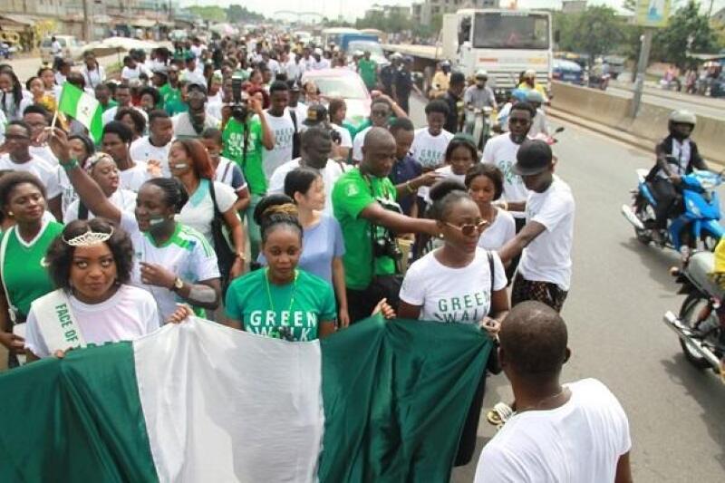 A march gathers in a road in Nigeria.