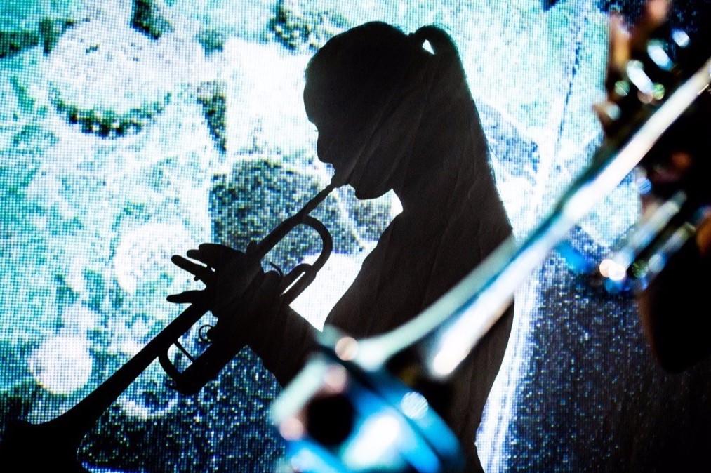 Image of Masary Studios Performer playing a trumpet