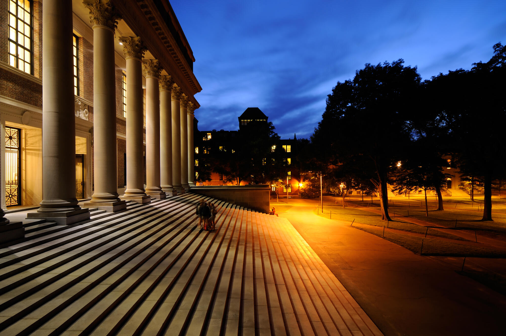 The steps of Widener Library at night