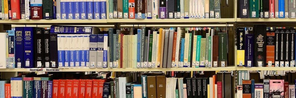 Stock photo of a bookshelf in a library