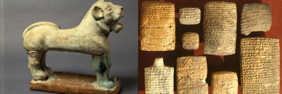 On the left, a lion; to the right, a series of cuneiform tablets.
