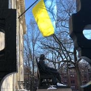 The flag of Ukraine flying in Harvard Yard.