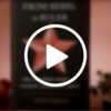 A play button sits on top of a blurred background in which you can make out the outline of a book against a red background