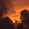 Orange sky and clouds. Flickr image by bonheureux
