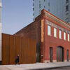 Front facade (red brick) of SculptureCenter building in Long Island